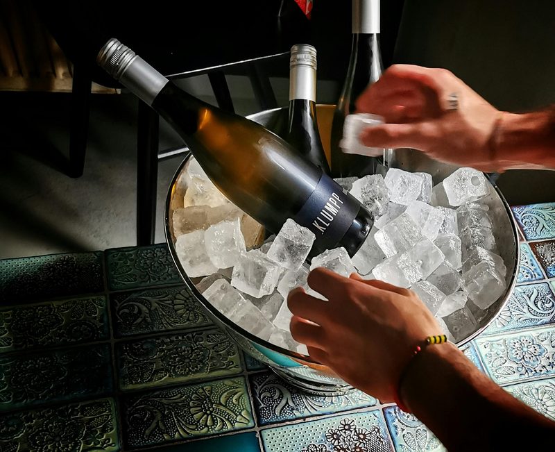 Bottles of wine chilling in an ice bucket